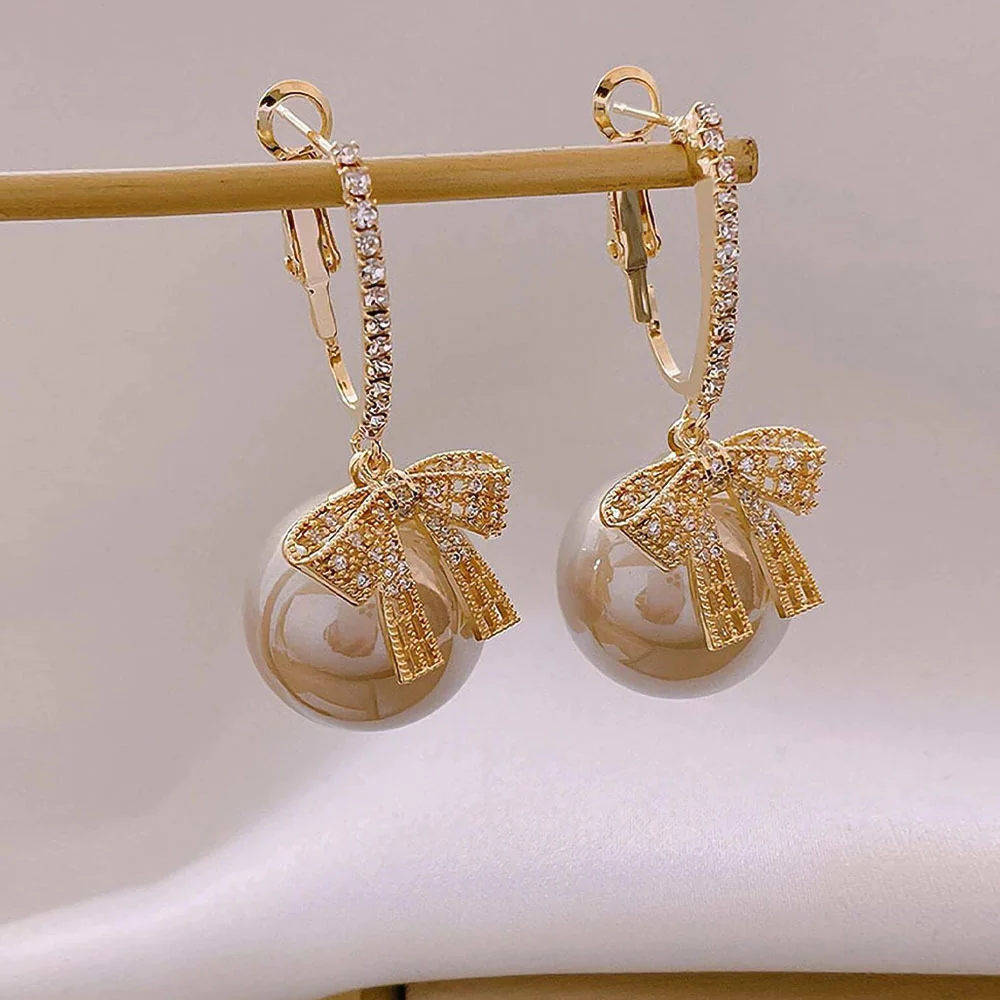 أقراط متدلي مزخرف بـ اللؤلؤ الصناعي